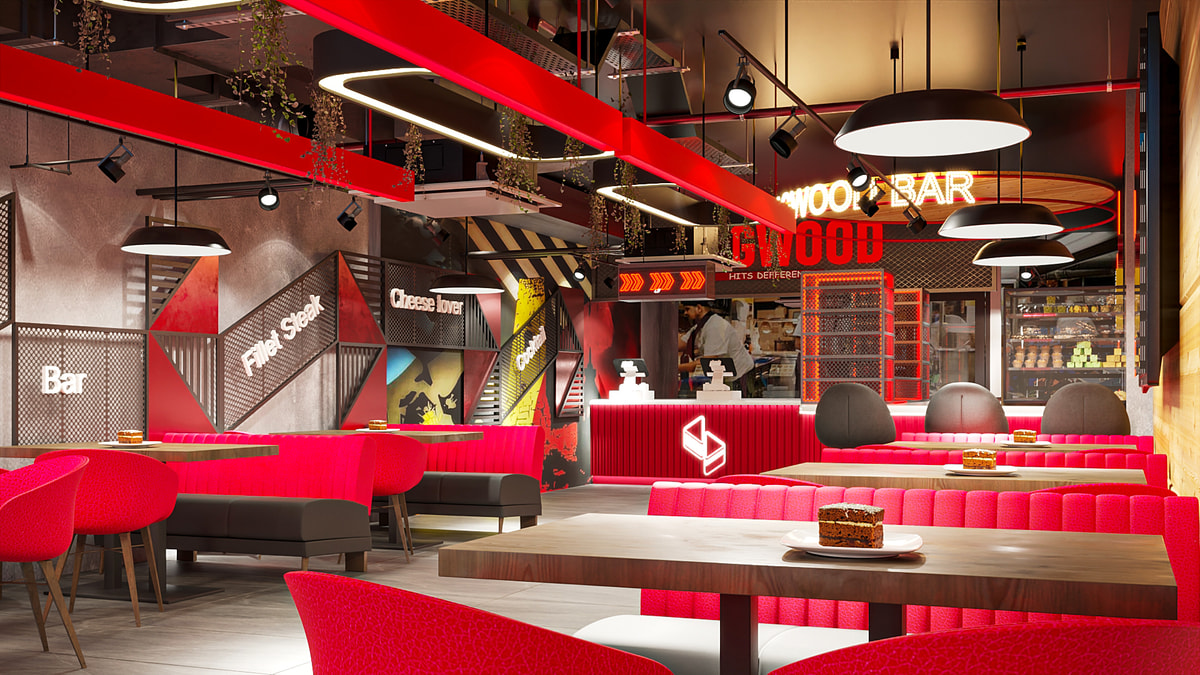 Restaurant seating with red accents and industrial ceiling details